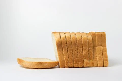 Sliced toast bread on a white plate.  Stock Photos