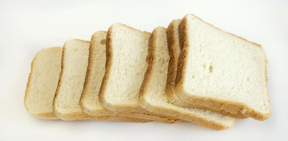 Sliced toasted bread. The concept of baking bread. 库存照片