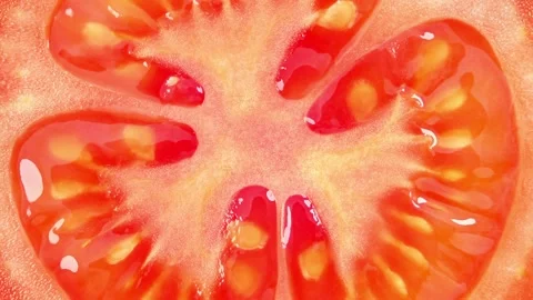 Sliced tomato, inner part, rotating 스톡 동영상 207801432
