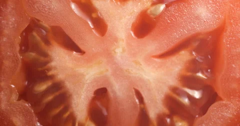 Sliced tomato rotating close up 스톡 동영상 141697856