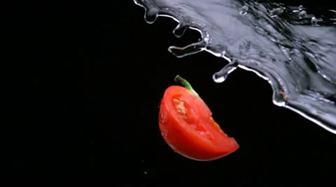 Sliced tomato, Slow Motion Stock Footage 9292759