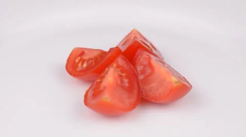 Sliced tomato on white plate Stock Footage 65227870