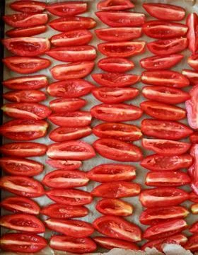 Sliced tomatoes background Stock Photos