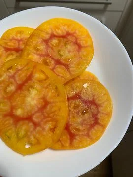 Sliced tomatoes Stock Photos