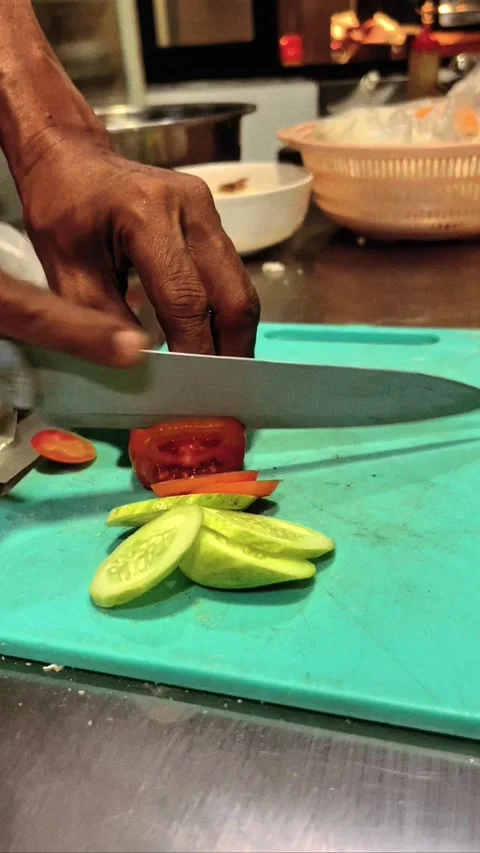 Sliced ??tomatoes on a tray for additional vegetables in the meal Stock Footage 333557205