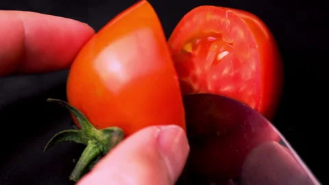 Sliced ​​tomatoes Two medium ripe tomatoes Prepare vegetarian food. Stock Footage 186960221