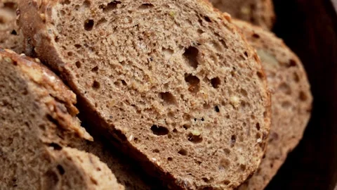 Sliced traditional German rye bread with porous crumb Stock Footage 333621891