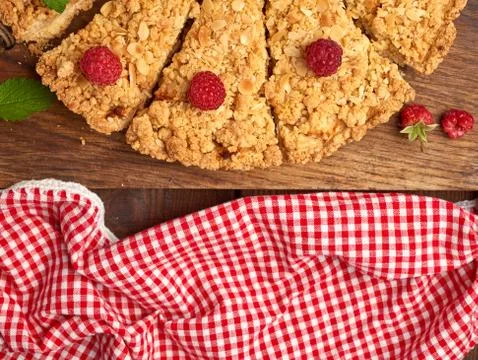 Sliced triangular pieces of crumble pie with apples Stock Photos