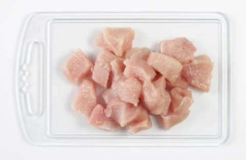 Sliced turkey meat on plastic beard 스톡 사진