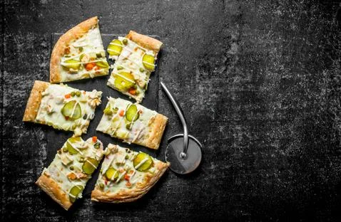 Sliced vegetable pizza. Stock Photos