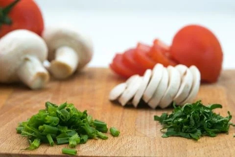 Sliced vegetables on a cutting board Stock Photos