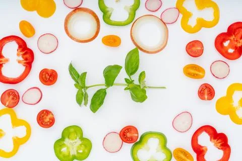 Sliced  vegetables pattern for cooking design on white background top view fl Stock Photos