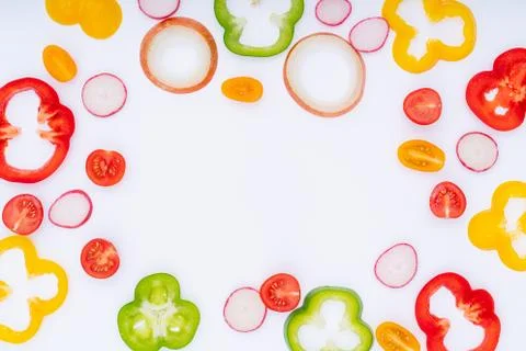 Sliced  vegetables pattern for cooking design on white background top view fl Stock Photos