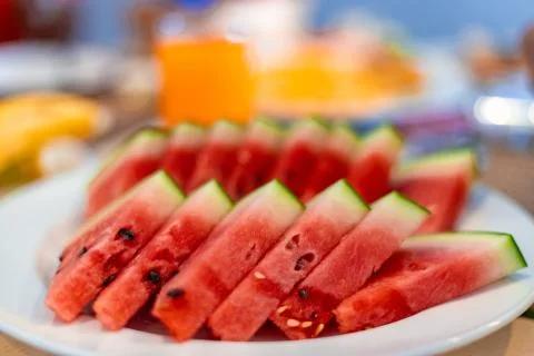 Sliced Watermelon fruits served with breakfast. Healthy breakfast concept. Stock Photos