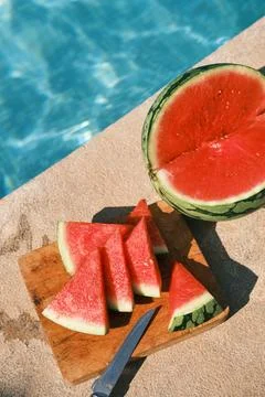 Sliced watermelon is lying by the pool Foto stock