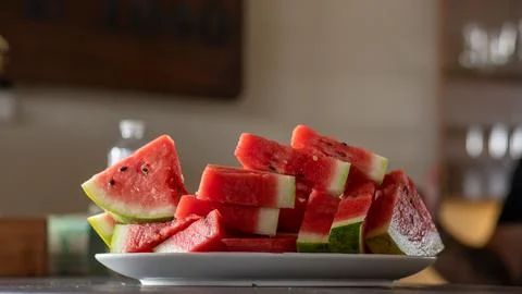 Sliced watermelon on a plate Stock Photos