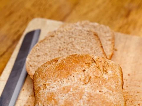 Sliced wheat bread and jam Stock Photos