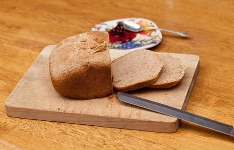 Sliced wheat bread and jam Stock Photos