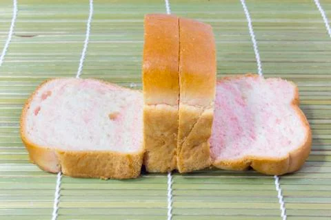 Sliced wheat bread on background Stock Photos