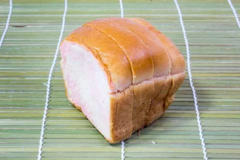 Sliced wheat bread on background Foto stock