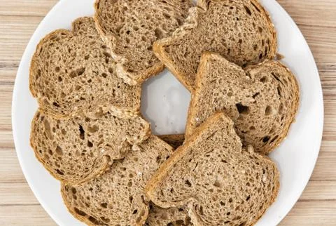 Sliced wheaten bread in circle shape, food theme Stock Photos