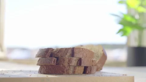 Sliced White Bread Falling on the Table in Slow Motion Stock Footage 223344187