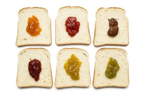 Sliced white bread with jam Stock Photos