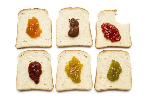 Sliced white bread with jam Stock Photos