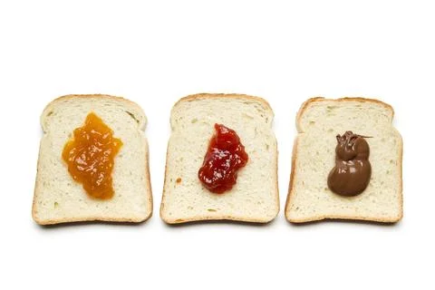 Sliced white bread with jam Stock Photos