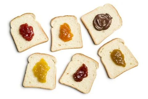 Sliced white bread with jam Stock Photos