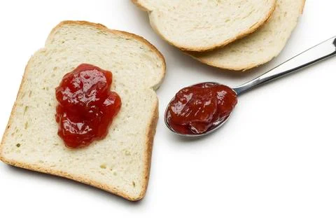 Sliced white bread with jam Stock Photos