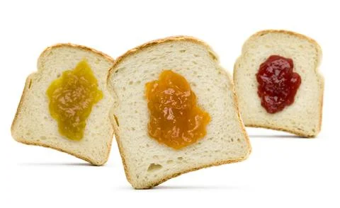Sliced white bread with jam Stock Photos