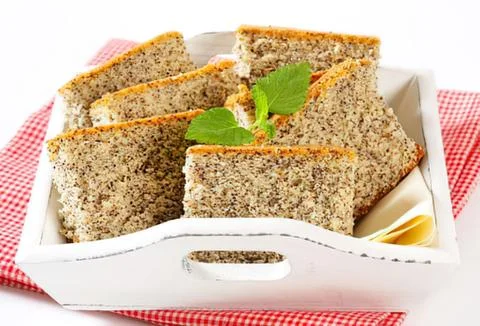 Sliced whole grain bread with lemon garnish Stock Photos
