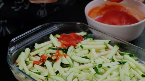 Sliced Zucchini with Red Sauce Dressing in Cooking Kitchen Stock Footage 341447723