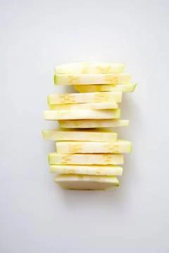 Sliced zucchini stack on white background Sliced zucchini stack isolated o... 스톡 사진