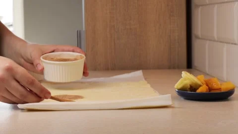 Slices of apple placed on layered dough, apple scene expressing taste, colo.. Stock Footage 320956059