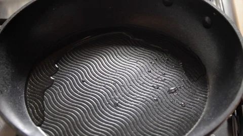 Slices of Bacon in a Frying Pan Stock Footage 85383182