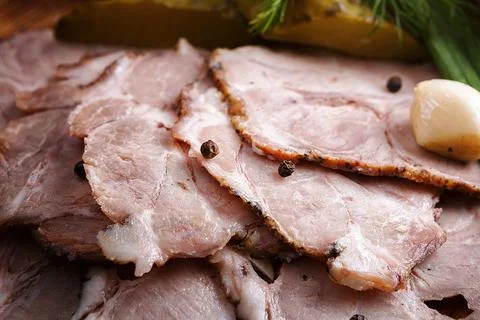Slices of baked meat. Close up Stock Photos
