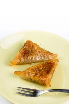 Slices of baklava pie with walnuts served on the plate Foto stock
