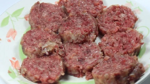 Slices of boiled pork cotecino Stock Footage 101832393