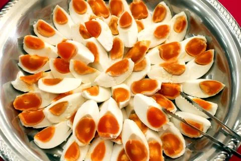 Slices boiled salted egg Stock Photos