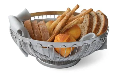 Slices of bread, bread sticks and proja in basket Foto stock