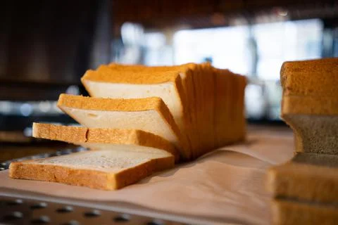 Slices of bread on the breakfast table in a luxury hotel. Stock Photos