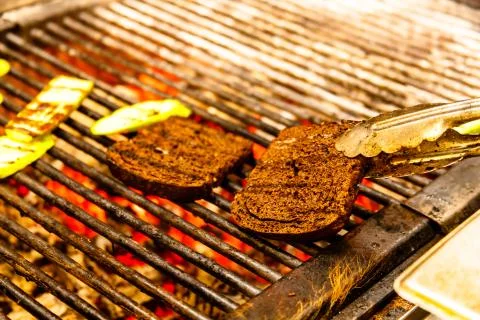 Slices of bread fried on the grill Stock Photos