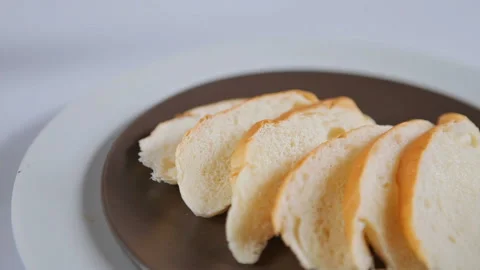 Slices of Bread, garllic bread. slider shoot Stock Footage 130842550