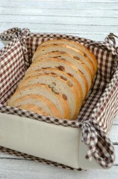 Slices of bread inside bread bin Stock Photos