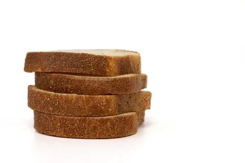 Slices of bread isolated on white background, side view Stock Photos