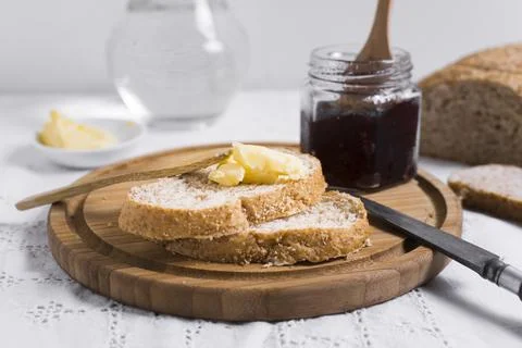 Slices bread with jam butter front view Stock Photos