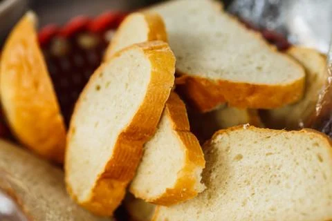 Slices of bread loaf closeup Stock Photos