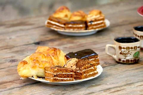Slices of cake with coffee Stock Photos